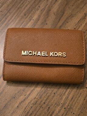 Michael Kors Brown Pebbled Leather Trifold Wallet with Gold Logo